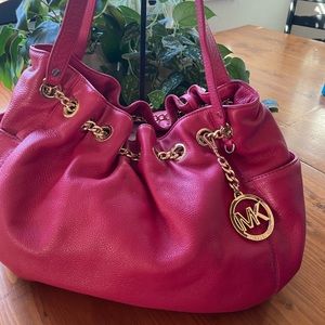 Bold pink Michael Kors shoulder bag